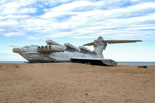 Abandoned Soviet ekranoplane rocket ship "Lun" on the shore of the Caspian Sea on a cloudy September evening