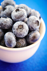 Close-up of fresh blueberries with water droplets	