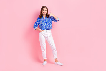 Full length photo of funky pretty lady wear print shirt showing thumb up empty space isolated pink color background