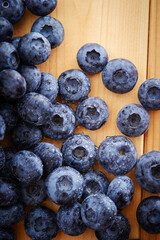 fresh blueberries on wooden background