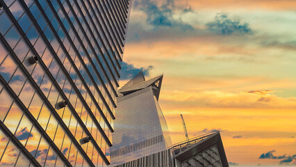 Reflection of clouds on the skyscraper facade in New York