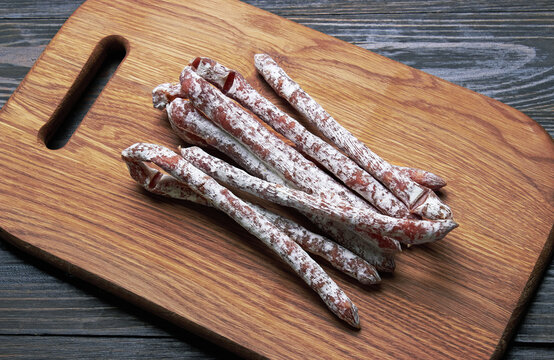 Salami sausages on a wood