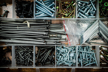 Various nails and bolts for fastening. 