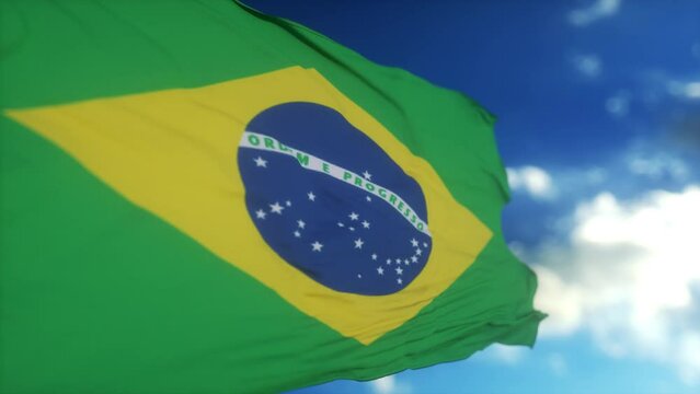 Realistic flag of Brazil waving in the wind against deep blue sky
