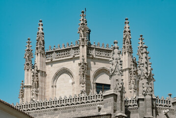 Fototapeta na wymiar Toledo, España. April 29, 2022: Facade and architecture of the Monastery of San Juan de los Reyes. 