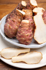 Group of fresh uncooked topinambur or Jerusalem artichoke roots