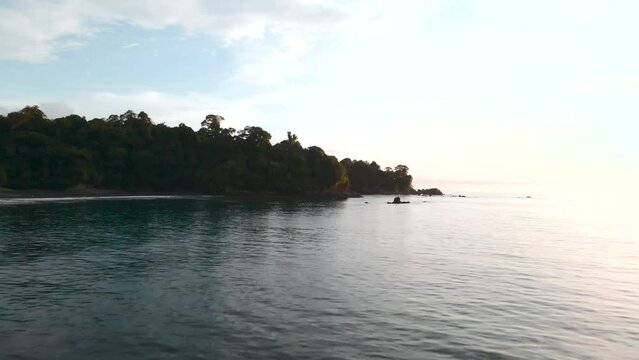 wide shot focusing on a sandy coast in the ocean of the colombian pacific coast of choco con in the afternoon