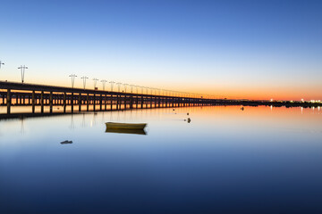 Long time exposure photograph of the Puente del Odiel or Puente-Sifón Santa Eulalia at sunset in Huelva, Andalusia, Spain