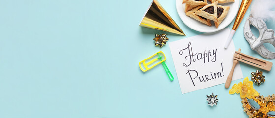 Greeting card and symbols of Purim on light blue background with space for text