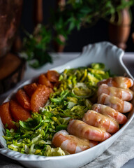 Winter salad: Shredded brussels sprouts salad with poached shrimp and orange supremes.