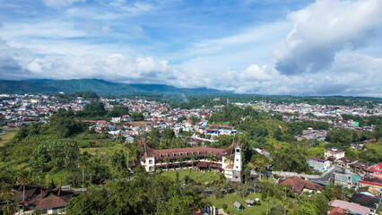 Fototapeta na wymiar Aerial view of Traditional Minangkabau houses located in Bukittinggi, West Sumatra, Indonesia. 