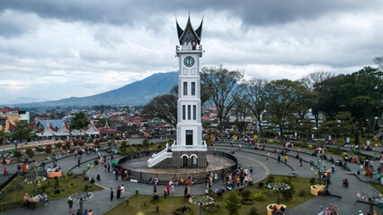 Aerial view of Jam Gadang, a historical and most famous landmark in BukitTinggi City, an icon of the city and the most visited tourist destination by tourists.