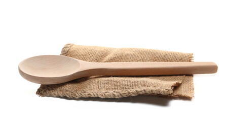 Empty new wooden spoon with jute sack isolated on white 