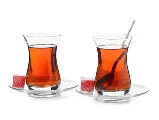 Fototapeta na wymiar Cups of tasty Turkish tea on white background