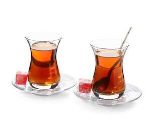 Cups of tasty Turkish tea on white background
