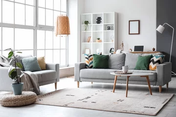 Foto op Plexiglas Interior of modern living room with grey sofas, window and shelving unit © Pixel-Shot