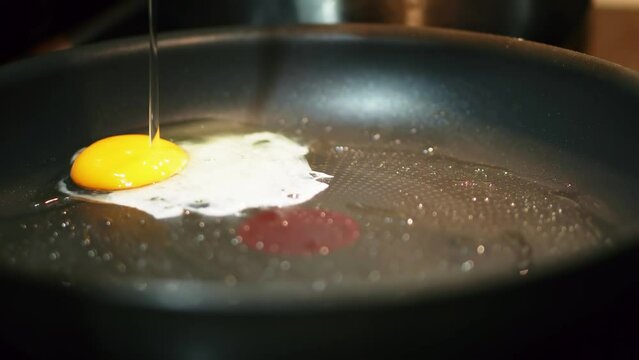fried eggs omlet in frying pan. yolk on pan