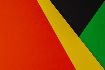 Black History Month background. Abstract geometric black, red, yellow, green color paper background