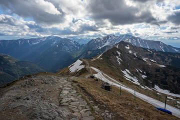 Fototapeta na wymiar The red ridge trail from Kasprowy peak. Tatra Mountains.