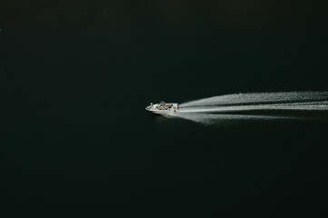 Speeding Across the Lake in a Fishing Boat