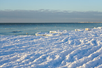 Ice formation on the coast of the Baltic Sea, water waves turning into ice waves due to strong frost