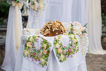 Traditional Ukrainian wedding bread (loaf). Wedding ceremony and wedding decorations, arch.