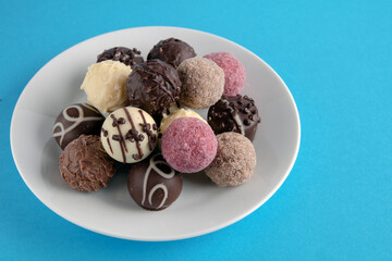 photo of different chocolates in a plate