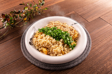 Xiang Wei Lao Eggplant with Minced Meat, Salted Egg Yolk, Minced Garlic, Chopped Coriander served dish isolated on wooden table top view of Hong Kong food
