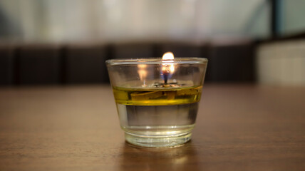 Glass candle light at the dinner table, romantic, or aromatic.