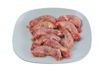Chicken necks in plate isolated on white background. Raw meat for cooking.