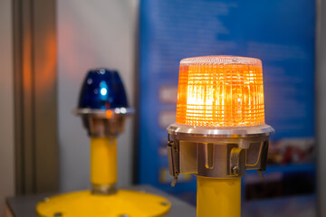 Close up of alarm lamp signal warning flashing lights for industrial machinery at emergency,...