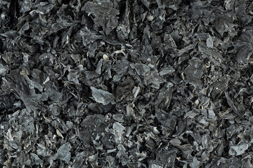 Texture of ash from burnt paper, as background. Cinder.