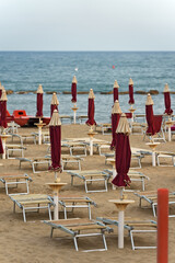 Sun loungers and umbrellas on the beach.