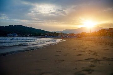 Beautiful sunset on the beach in Scauri, Italy.