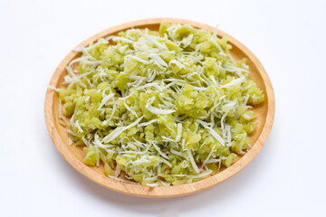 Green rice Thai dessert with coconut (Khao Mao)