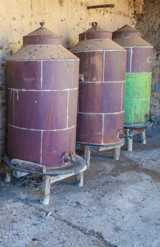 Rusty disused olive oil drums