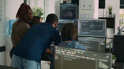 Database admins collaborating on group project compiling algorithm for new cloud computing user...