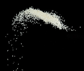 Japanese Rice flying explosion, white grain rices explode abstract cloud fly. Beautiful complete seed rice splash in air, food object design. Selective focus freeze shot Black background isolated