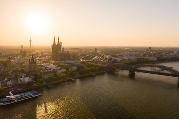 View of Cologne, the Rhine river and Cathedral by sunset