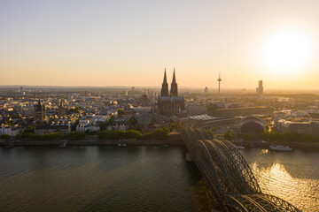 View of Cologne, the Rhine river and Cathedral by sunset