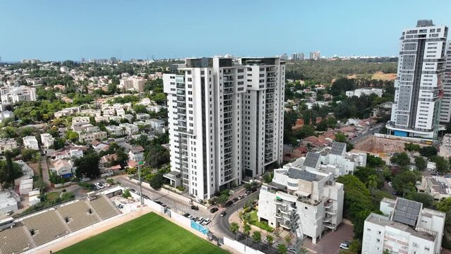 Aerial footage of residential towers in the city of Ramat Hasharon, Israel