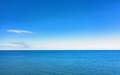 Fototapeta na wymiar Horizon line, blue sky and blue sea. Drone view