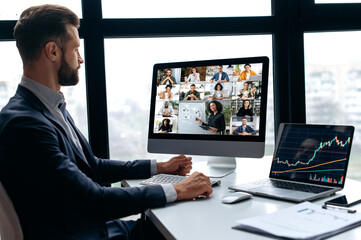 Successful business man, company boss, stock investor, conducts financial brainstorm with group of...