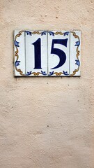 number fifteen on a wall