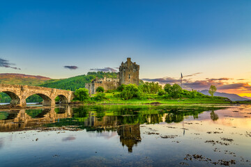 Eilean Donan Castle at sunset in Scotland