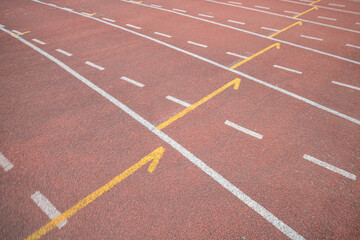 Empty fast running lane in outdoor sport stadium