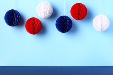 Blue red and white paper balls decorations on blue background. Happy Presidents Day, 4th of July,...