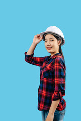 Young female engineer wearing yellow helmet stand with charming smile posture