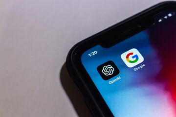 Vancouver, CANADA - Jan 23 2023 : Icons of OpenAI and Google seen in an iPhone screen. OpenAI is an US artificial intelligence (AI) research laboratory