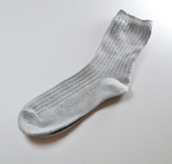 the grey color Socks on white background